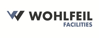 WOHLFEIL Facilities Logo - scrollt Webseite nach oben